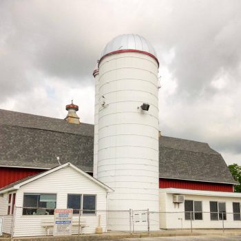 The difference that new paint and roof can make to a silo.