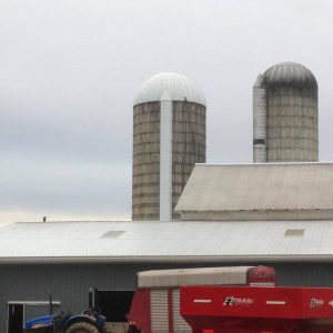 This silo just got a new white roof and chute.